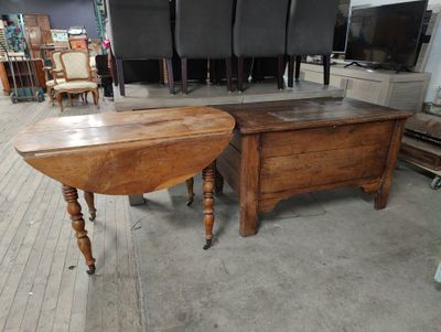 two tables that are sitting in the middle of a room