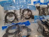 a lot of cables and wires wrapped in plastic bags
