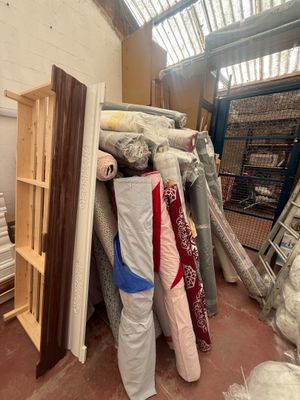 a room filled with lots of different types of furniture