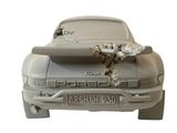 a toy car with a broken hood on it ' s hood