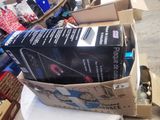 a box full of electronics sitting on top of a table
