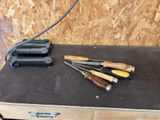 a lot of tools that are sitting on top of a table