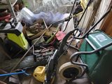 a picture of a pile of clutter in a garage