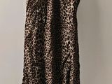 leopard print slip on a hanger next to a leopard print slip on a hanger