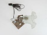 a lamp that has a fish on it with a cord