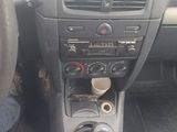 a picture of a car dashboard with a steering control