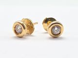 une paire de boucles d'oreilles en or et diamants