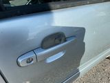 a close up of a door handle on a car