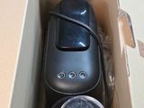 a box that has a coffee maker inside of it