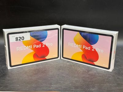 two redmi pad 2s are sitting next to each other on a table