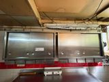 a picture of a commercial kitchen with stainless steel appliances