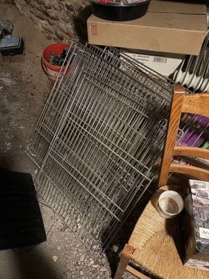 a pile of junk on the ground next to a chair
