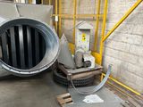 an image of a large industrial exhaust fan in a warehouse