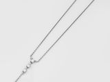 a close up of a chain with a star on it