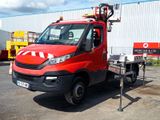 a red truck with a crane on the back of it