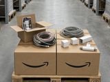 an image of a box with a cable and a box with a phone on it