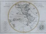 an old map of the world with a compass on it