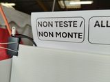 a sign that says non teste / all non monte on it