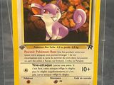 a pokemon card with a picture of a cat on it