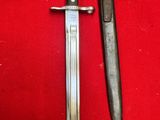 a knife and a knife holder on a red cloth