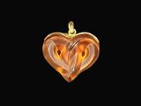 an image of a heart shaped glass pendant with a gold chain