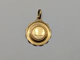 an image of a gold locke with a coin in the center