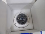 a white box with a camera inside of it