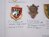 several badges on a piece of paper with writing on it