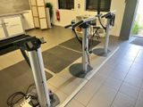 two machines that are sitting in a room