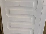 an image of a white refrigerator in a kitchen