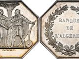 a close up of a coin with a picture of two people on it