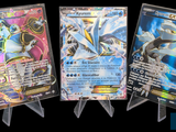 Trois types différents de cartes Pokémon sont représentés sur un fond noir