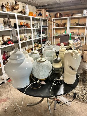 many vases on the table in the room