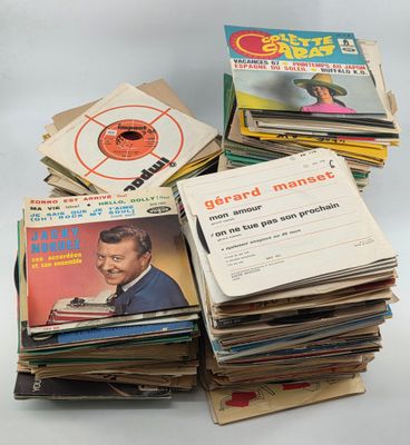 a lot of records stacked on top of each other