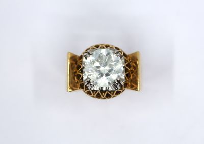 an image of a diamond ring on a white surface