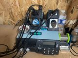 a bunch of electronics that are sitting on the floor