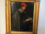 a painting of a man with a red hat on a wall