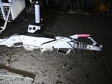 a white machine that is laying on the ground