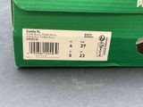 a green box with a picture of a cat inside of it