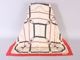 an image of a white and red blanket with chains on it