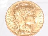 an image of a gold coin with a woman ' s head on it