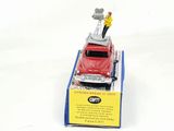 a toy car with a man standing on top of it
