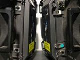 two speakers that are sitting next to each other