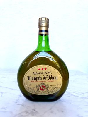 a bottle of liquor that is sitting on a table