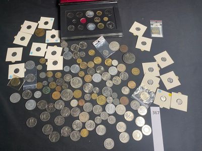 a lot of coins that are sitting on a table