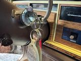 a close up of a car dashboard with a key in it