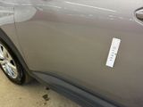 a sticker on the side of a car that has a sticker on it