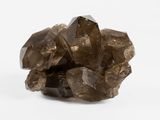 a close up of a cluster of rocks on a white surface