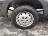 a close up of a tire on a truck