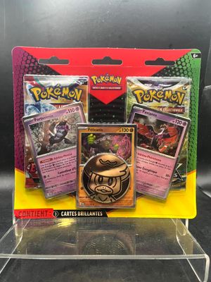 a close up of a box of pokemon cards on a table